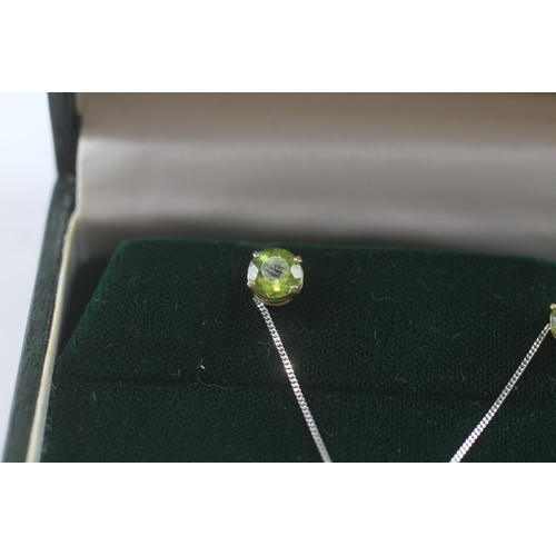 100 - 9ct white gold x2 peridot pendant necklace & stud earrings set (2.4g)