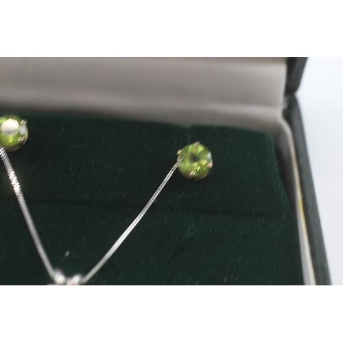 100 - 9ct white gold x2 peridot pendant necklace & stud earrings set (2.4g)