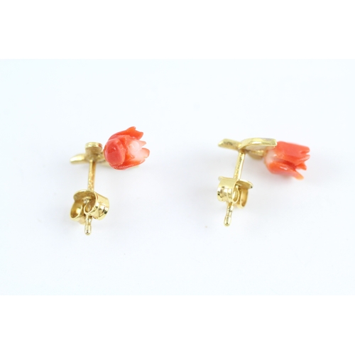 103 - 9ct gold diamond & coral floral stud earrings (1.2g)