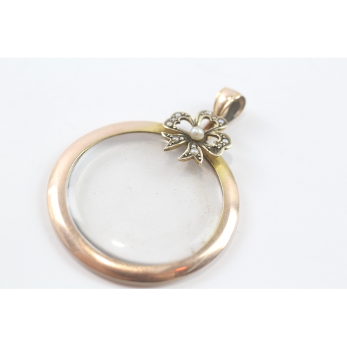 104 - 9ct gold pearl locket (5.8g)