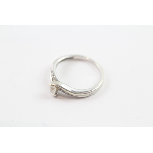 108 - 9ct white gold tension set bypass dress ring (2.4g) Size N