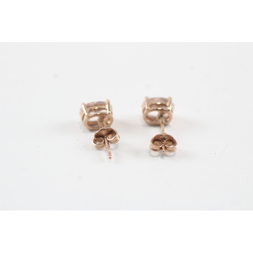 111 - 9ct rose gold pink gemstone stud earrings (1.2g)