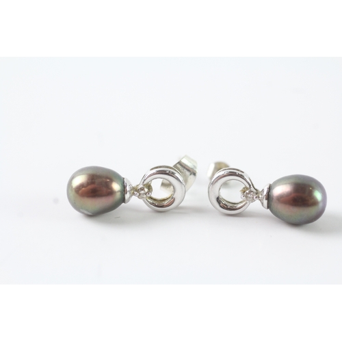 125 - 9ct white gold cultured pearl & diamond drop earring (2.6g)