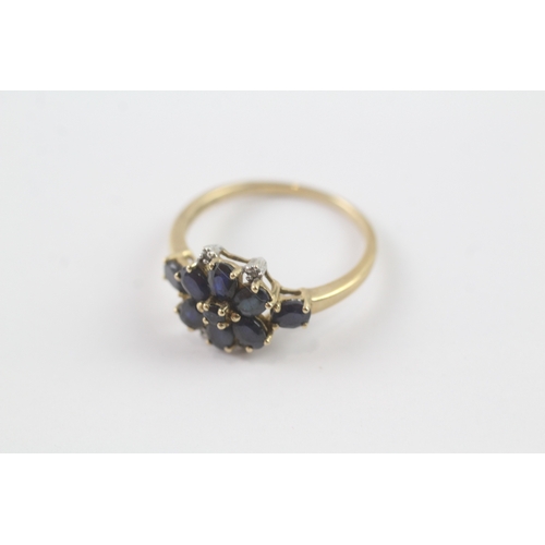 131 - 9ct gold sapphire & diamond floral cluster dress ring (2.2g) Size Q