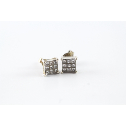 135 - 9ct white gold diamond stud earrings (1.6g)