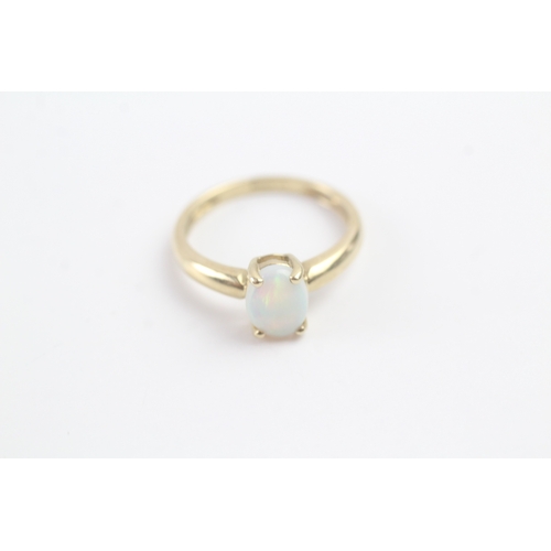 150 - 9ct gold cabochon cut opal ring (1.7g) Size K