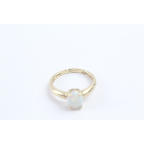 150 - 9ct gold cabochon cut opal ring (1.7g) Size K