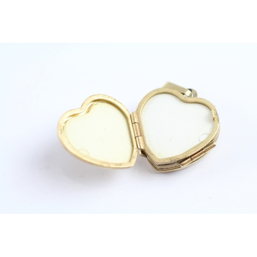 154 - 9ct gold vintage patterned heart shape double locket (3.9g)