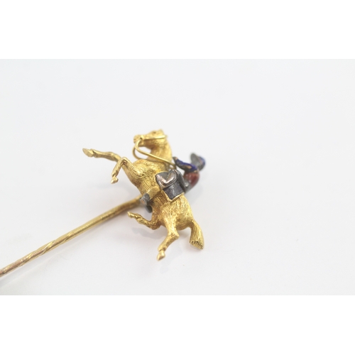 16 - 18ct gold enamel on silver jockey on racehorse stick pin - 15ct pin (3.6g)