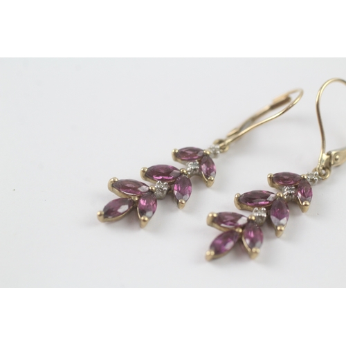 166 - 9ct gold marquise cut purple gemstone & diamond foliate drop earrings (2.5g)