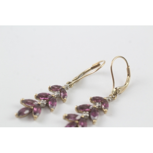 166 - 9ct gold marquise cut purple gemstone & diamond foliate drop earrings (2.5g)