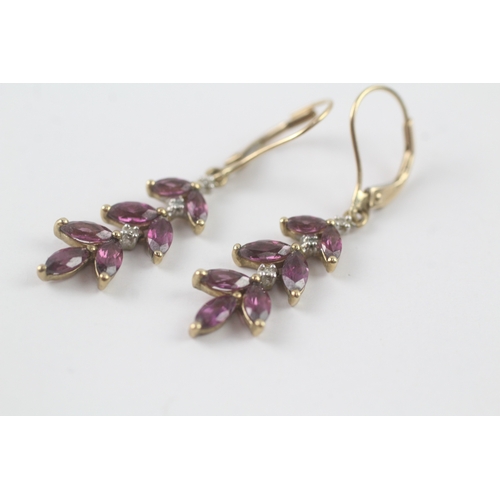 166 - 9ct gold marquise cut purple gemstone & diamond foliate drop earrings (2.5g)