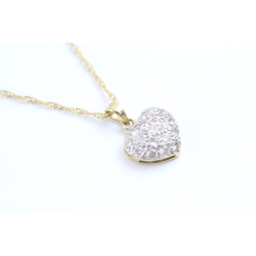 174 - 9ct gold diamond heart pendant necklace (1.8g)