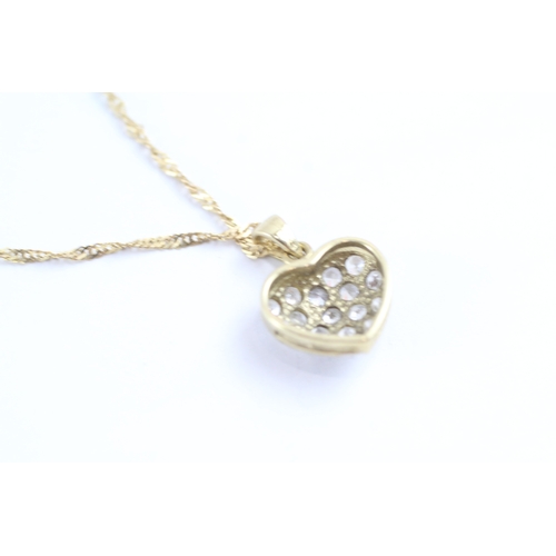 174 - 9ct gold diamond heart pendant necklace (1.8g)