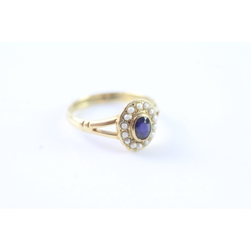 181 - 18ct gold sapphire and seed pearl halo ring (3g) Size M