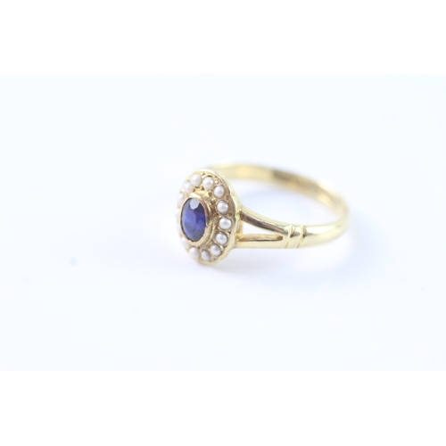 181 - 18ct gold sapphire and seed pearl halo ring (3g) Size M