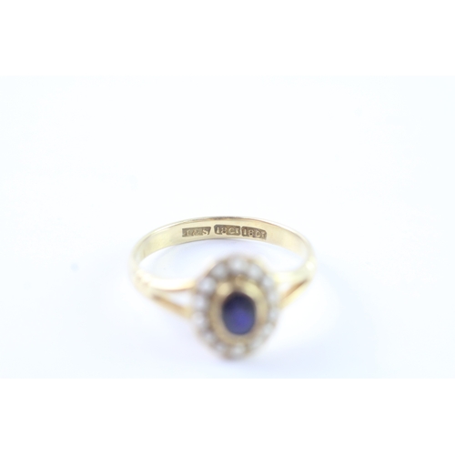 181 - 18ct gold sapphire and seed pearl halo ring (3g) Size M