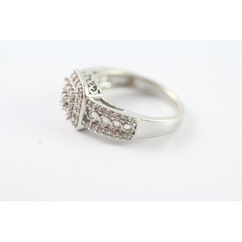 202 - 9ct white gold diamond cluster ring (5.1g) Size N