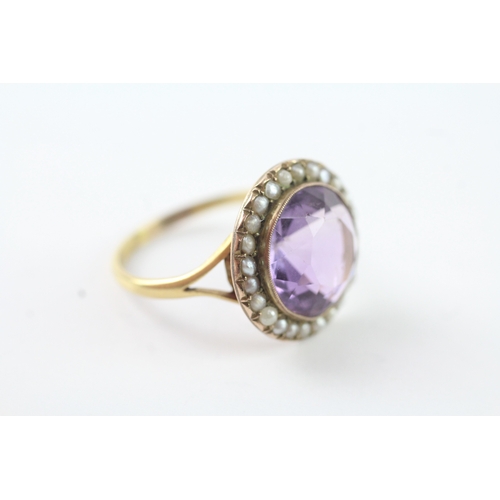 203 - 18ct gold amethyst and seed pearl halo ring (4.9g) Size R