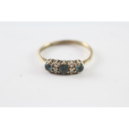 204 - 9ct gold blue gemstone & diamond dress ring (1.8g) Size P