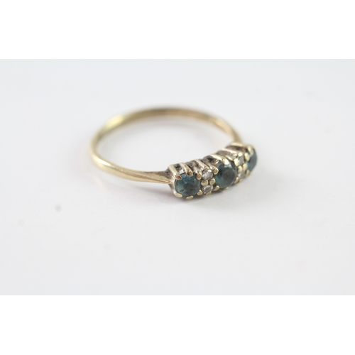 204 - 9ct gold blue gemstone & diamond dress ring (1.8g) Size P