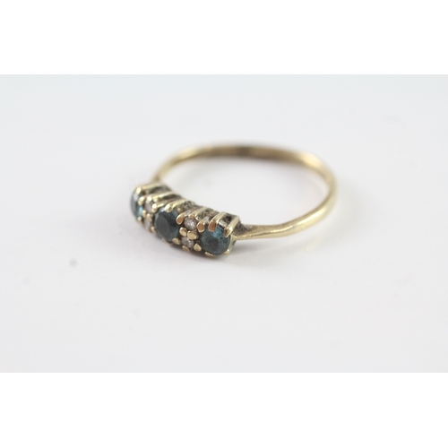 204 - 9ct gold blue gemstone & diamond dress ring (1.8g) Size P