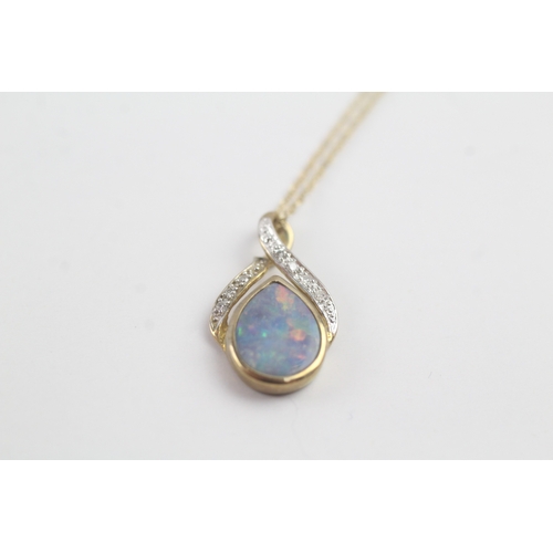 205 - 9ct gold opal & diamond pendant necklace (1.5g)