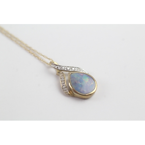 205 - 9ct gold opal & diamond pendant necklace (1.5g)