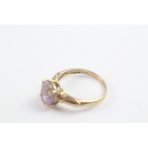 236 - 9ct gold oval cut ametrine dress ring (2.9g) Size O