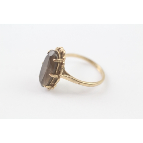 242 - 9ct gold smoky quartz cocktail ring (2.8g) Size M