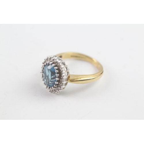 243 - 18ct gold diamond and topaz halo ring (5.5g) Size K