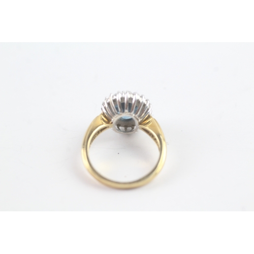 243 - 18ct gold diamond and topaz halo ring (5.5g) Size K