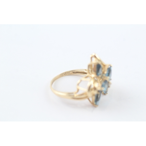 248 - 10ct gold blue gemstone and diamond floral ring (3.5g) Size I