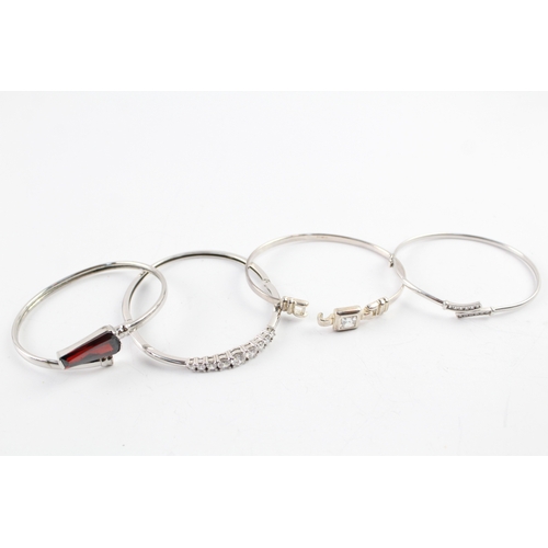 259 - Collection of Sterling Silver CZ Bangles inc. Bypass, Graduated, Faceted x 4 45g