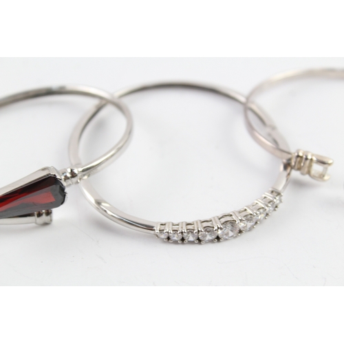 259 - Collection of Sterling Silver CZ Bangles inc. Bypass, Graduated, Faceted x 4 45g