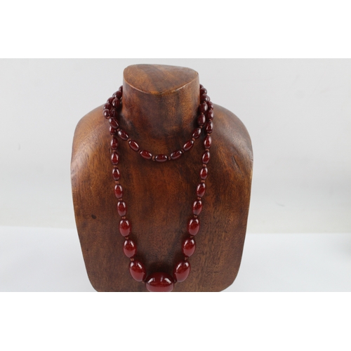 261 - Graduated Cherry Bakelite Necklace w/ Internal Streaking 53.8g