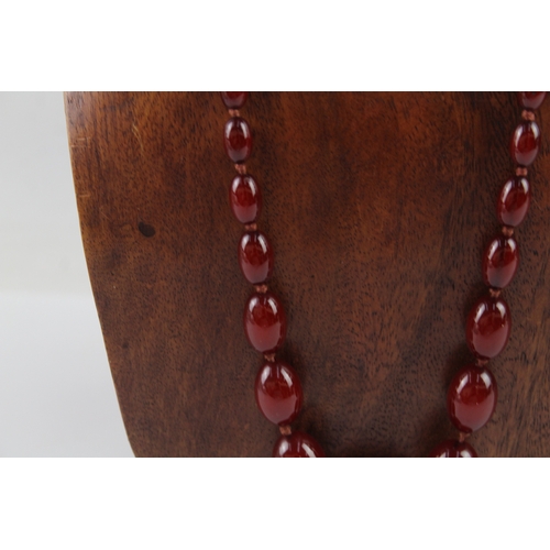 261 - Graduated Cherry Bakelite Necklace w/ Internal Streaking 53.8g