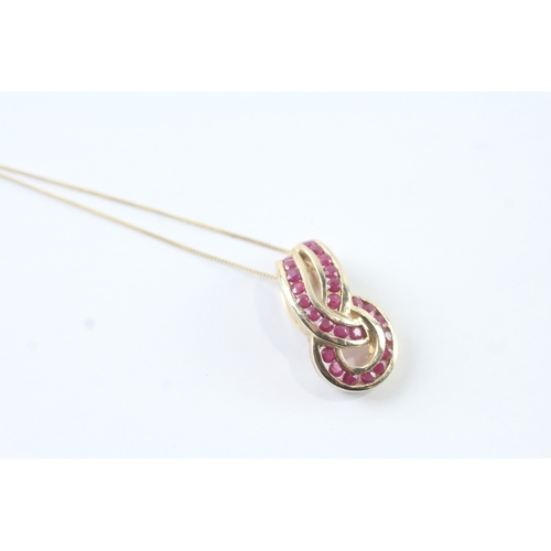 28 - 9ct gold ruby infinity knot pendant necklace (3.1g)