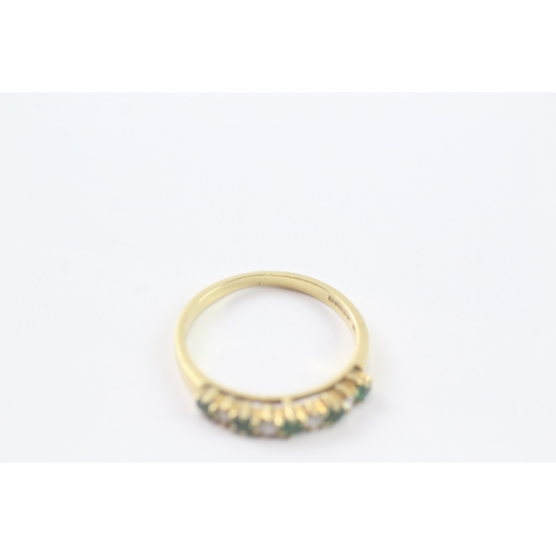 31 - 18ct gold diamond & emerald half eternity (2.2g) Size M