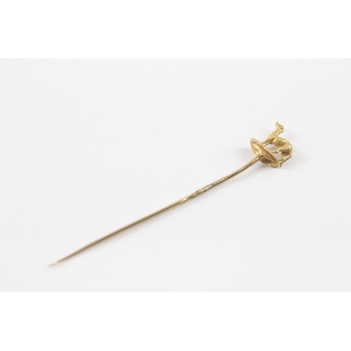 33 - 15ct gold dog stick pin (1.4g)