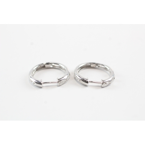 39 - 9ct white gold diamond hoop earrings (2.1g)