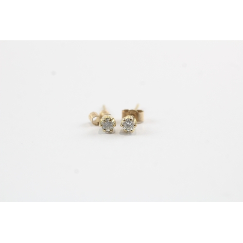 40 - 9ct gold diamond stud earrings (0.5g)