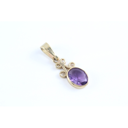 41 - 9ct gold amethyst drop pendant (1.6g)