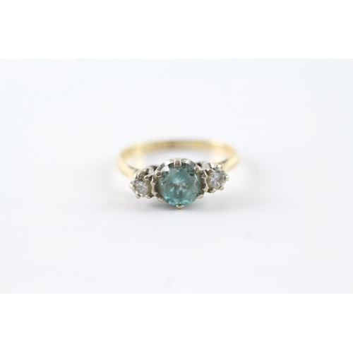 57 - 18ct gold diamond & blue zircon trilogy dress ring (3.1g) Size N