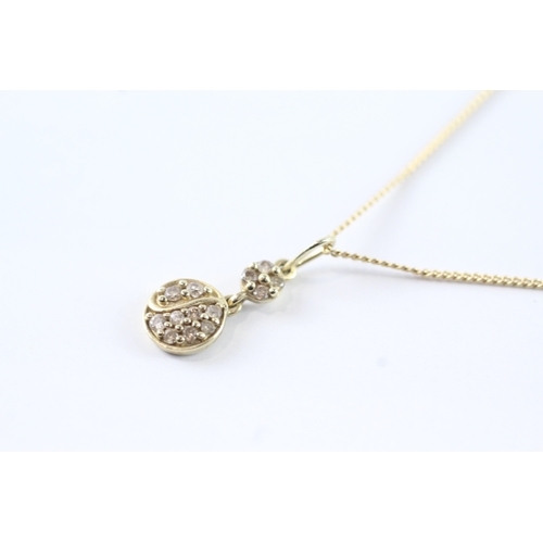 62 - 9ct gold diamond pendant necklace (2.1g)