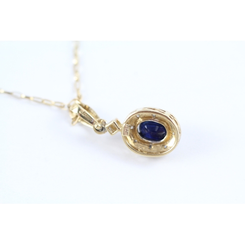 67 - 9ct gold Diamond & Sapphire cluster pendant necklace (1.3g)