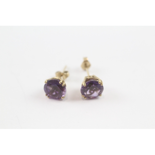 76 - 9ct gold amethyst stud earrings (1.8g)