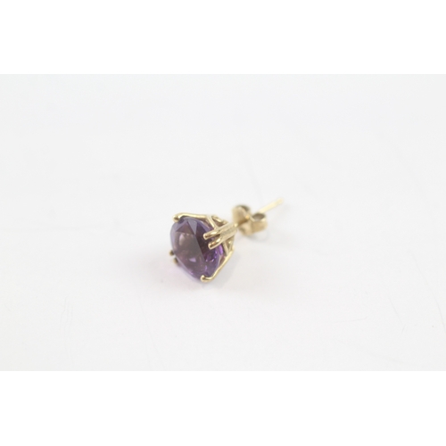 76 - 9ct gold amethyst stud earrings (1.8g)