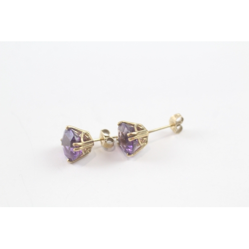 76 - 9ct gold amethyst stud earrings (1.8g)