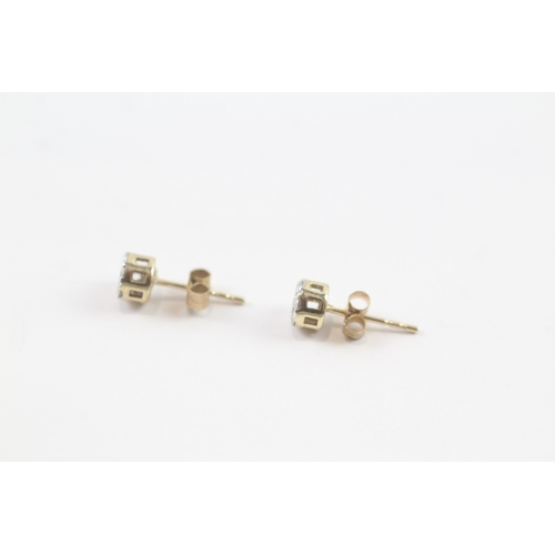 86 - 9ct gold diamond stud earrings (0.8g)